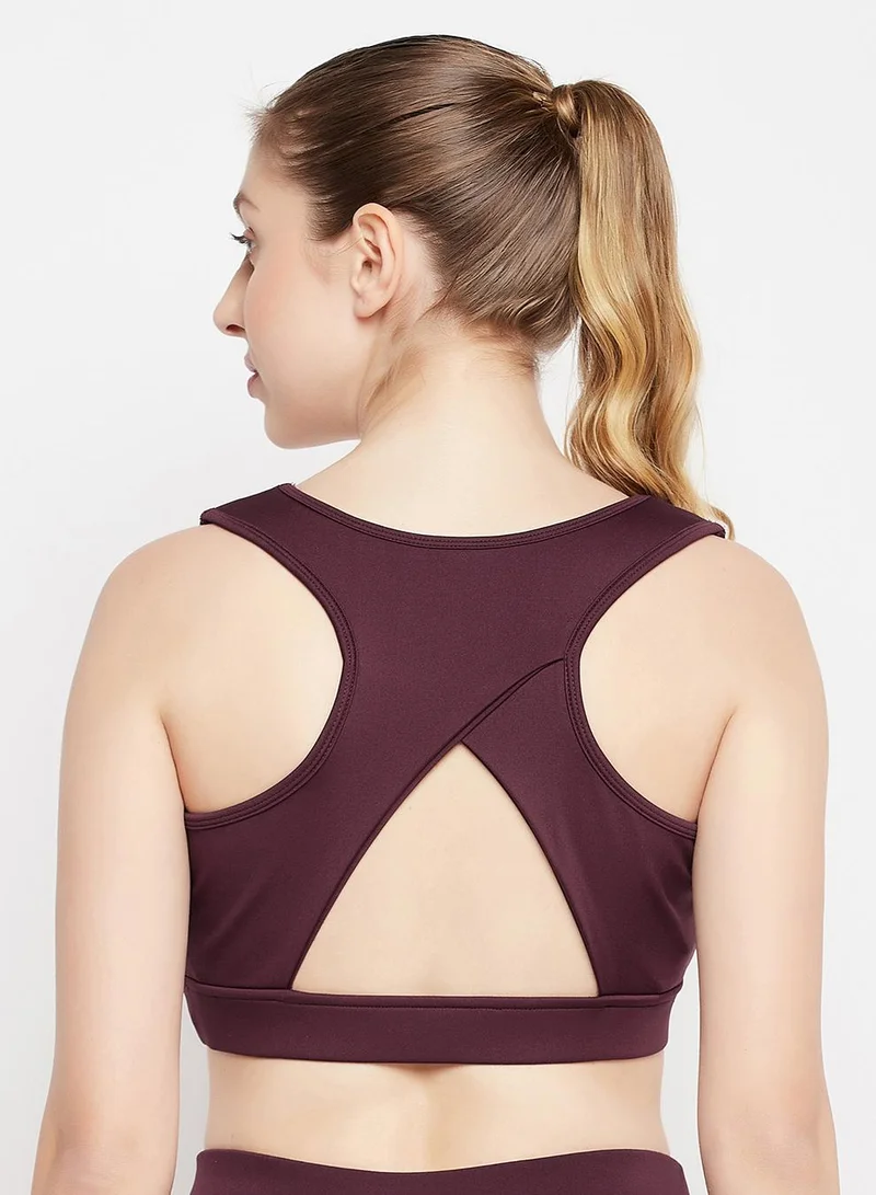 Clovia Red Medium Impact Padded Racerback Sports Bra in Maroon for Women | Best Price UAE